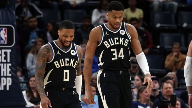 Milwaukee Bucks’ Damian Lillard and Giannis Antetokounmpo.